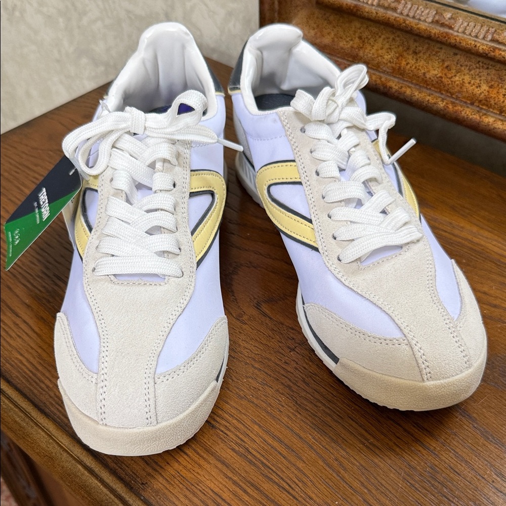 Tretorn White and Yellow women’s Sneakers. Size 8.5.